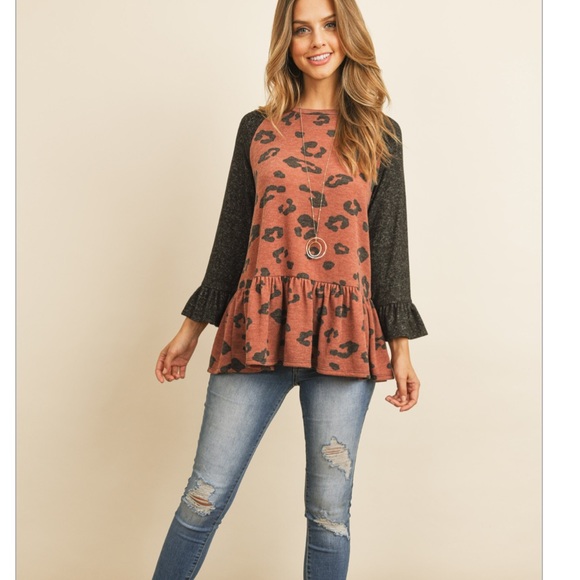 Beautiful New Rust Animal Print Peplum Top - Picture 2 of 5